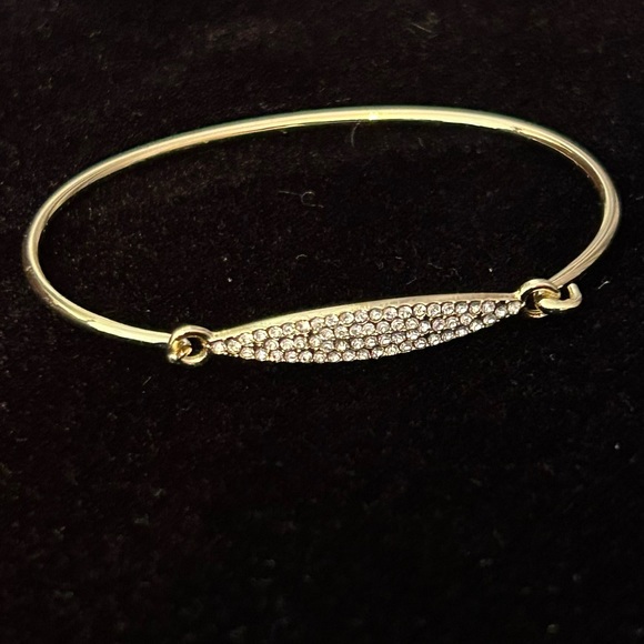 Clear Crystals Set in Gold Tone Latch Bangle Bracelet - Picture 9 of 11